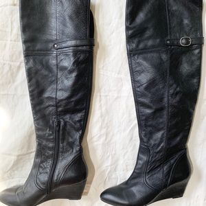 Black leather knee high boots